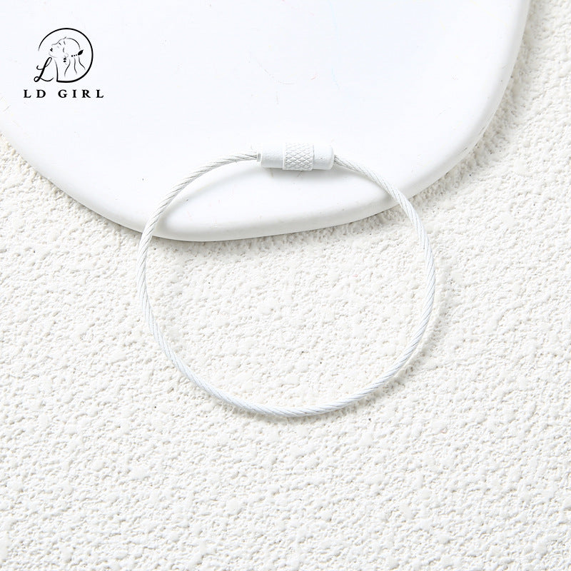 A candy colored wire rope ring