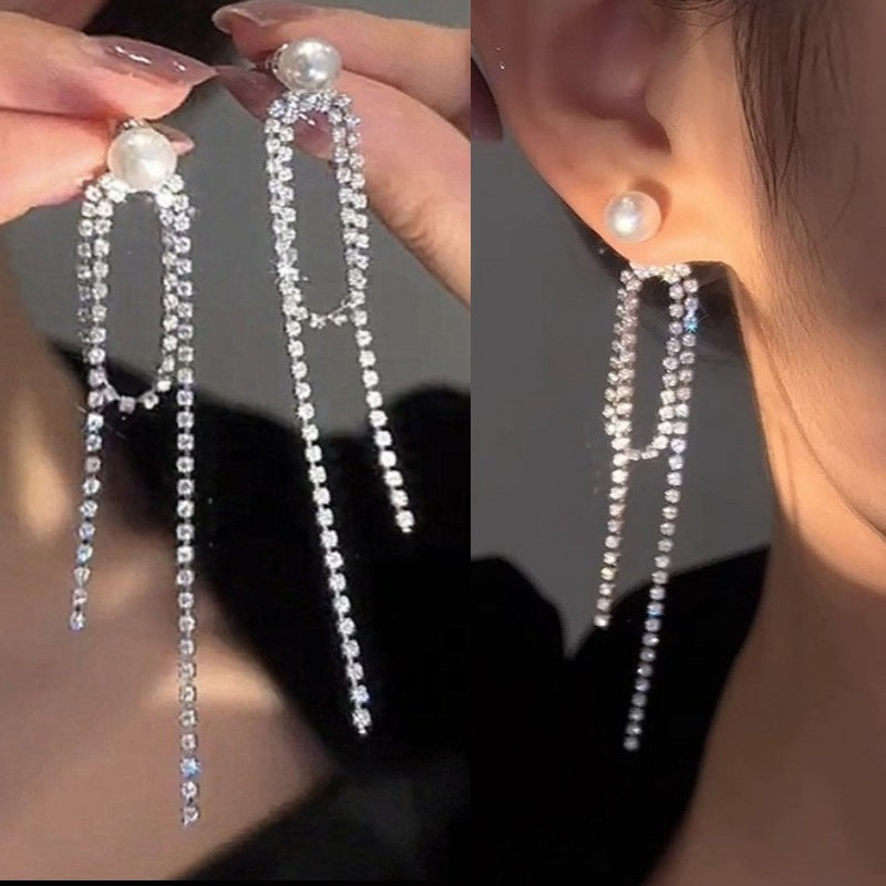 E15,925 Silver Needle Earrings  A