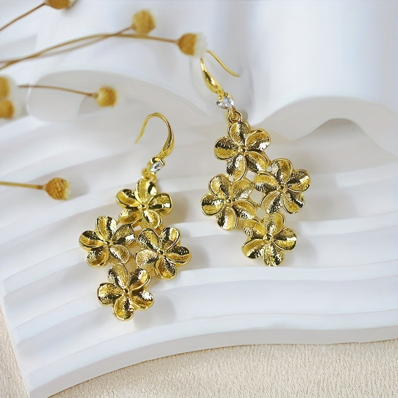 Gold flower earrings, fashionable commuting, versatile, stud earrings, light luxury earrings.