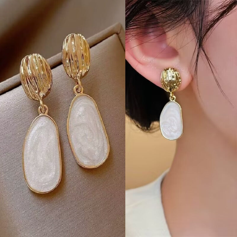 E15,925 Silver Needle Earrings  A