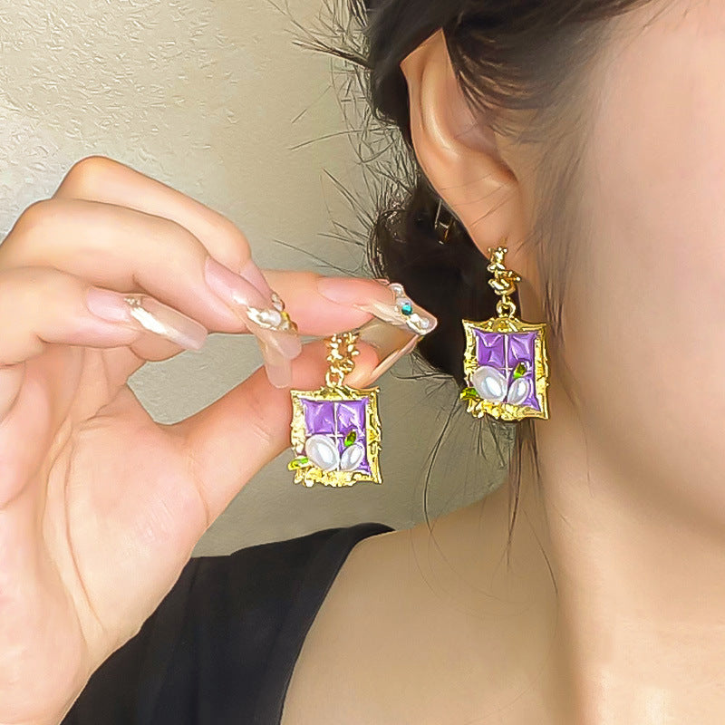 E1, Earrings
