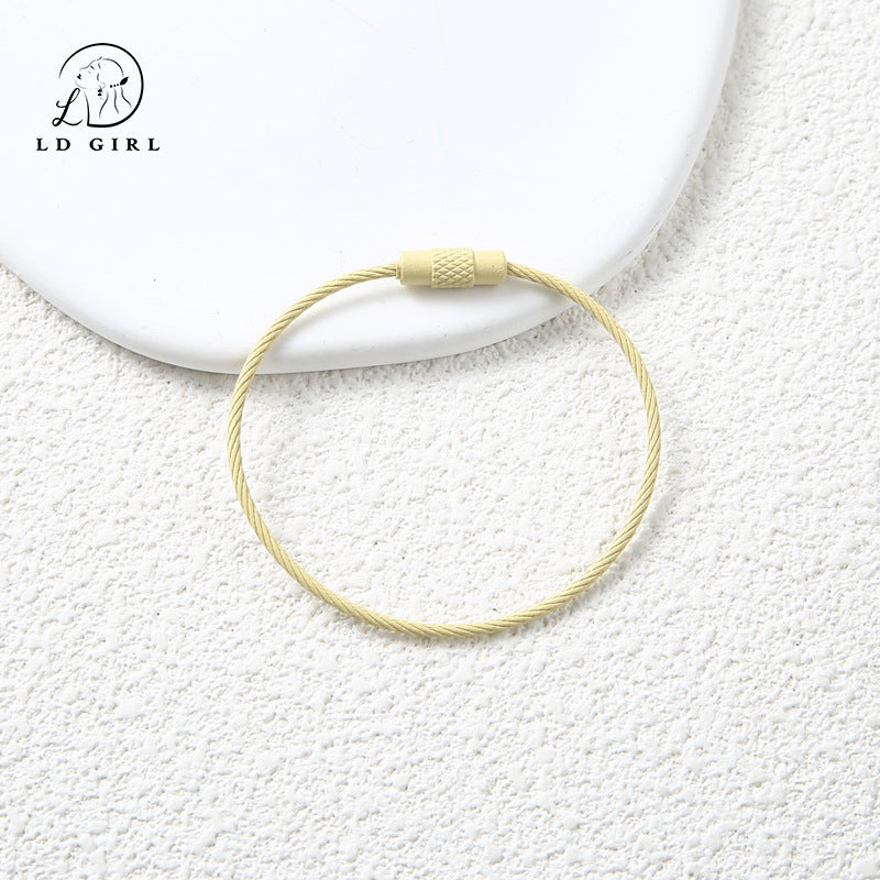 A candy colored wire rope ring