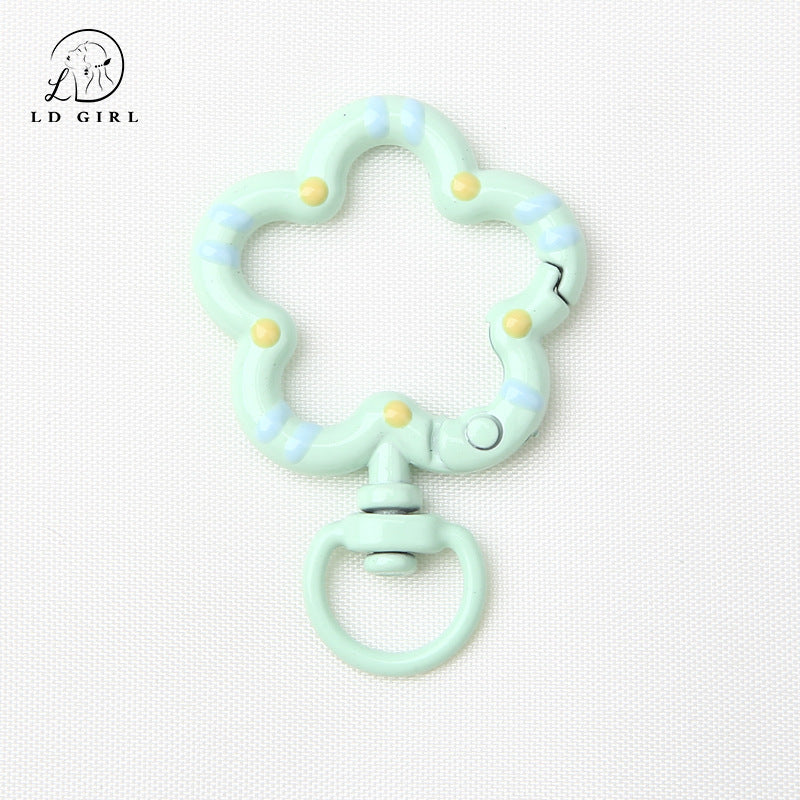 A small flower universal rotating spring buckle, flower opening ring, plum blossom spring ring, DIY jewelry accessories