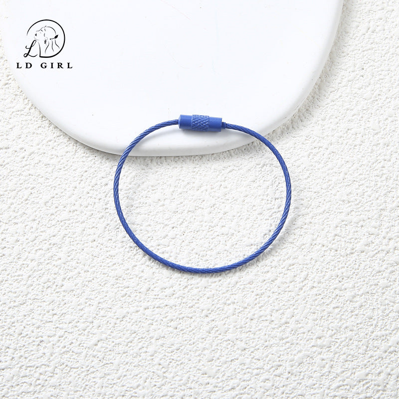 A candy colored wire rope ring